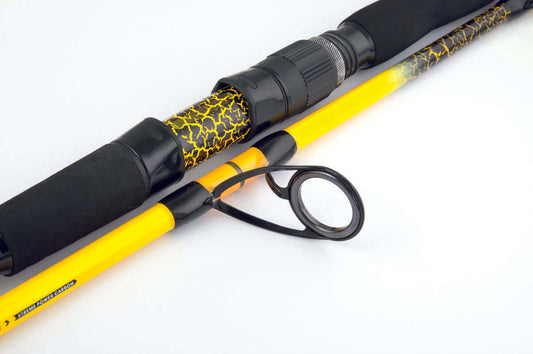 Catgear X-ROCK FIREBALL 2102/250 fishing rod close-up, showcasing its technical design and yellow finish.