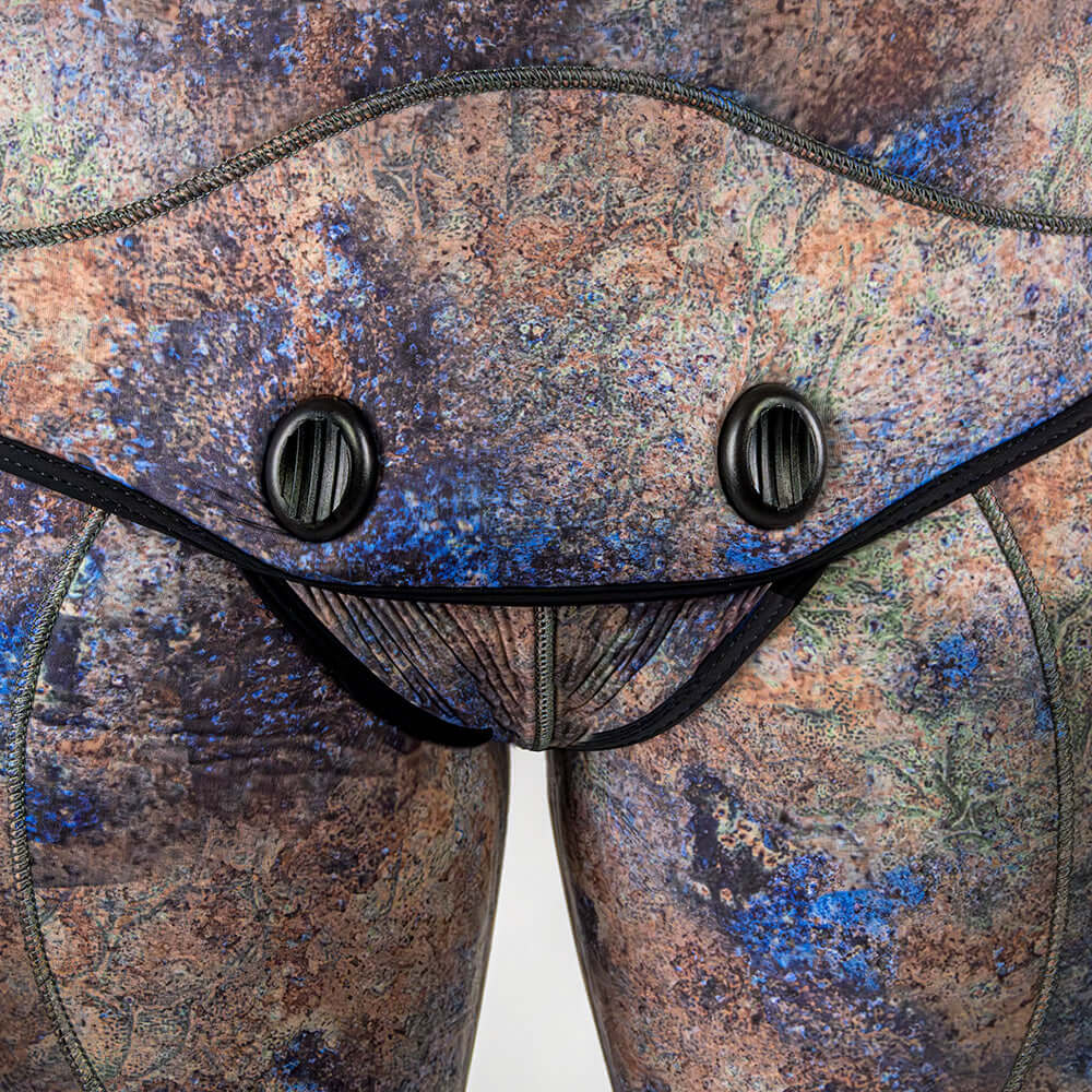 Abysstar Octoskin neoprene suit detail showing unique camouflage pattern and fastening features.